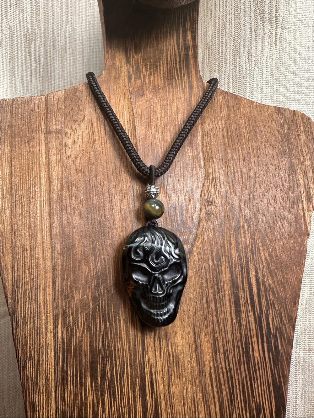 Unique Blue and Golden Tiger’s Eye Skull Carving Pendant Necklace on Brown